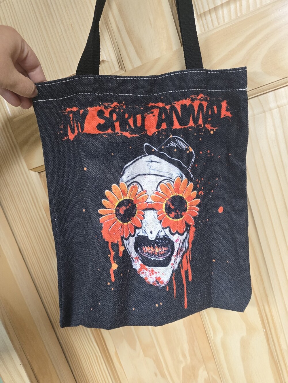 Graphic Black Tote with Orange Floral Skull Design